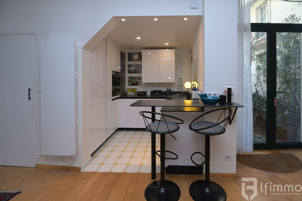 Photo 2 : Charmant rez de chaussée sur cour pavée au calme