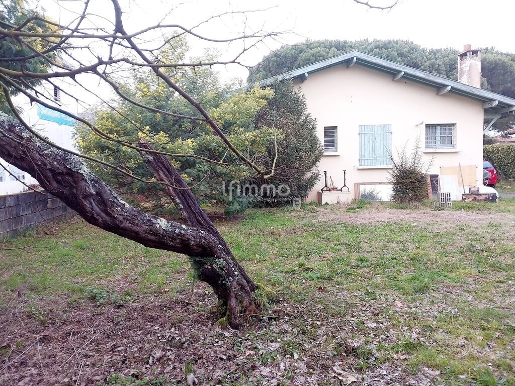 Photo 1 : Maison 4 pièces avec terrain de 730 m2 et garage