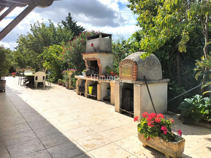 Photo 9 : Maison de caractère plain-pied avec terrain arboré