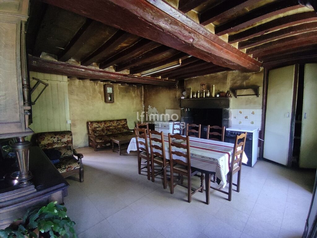 Photo 3 : Charmante maison en pierre à rénover dans cadre paisible