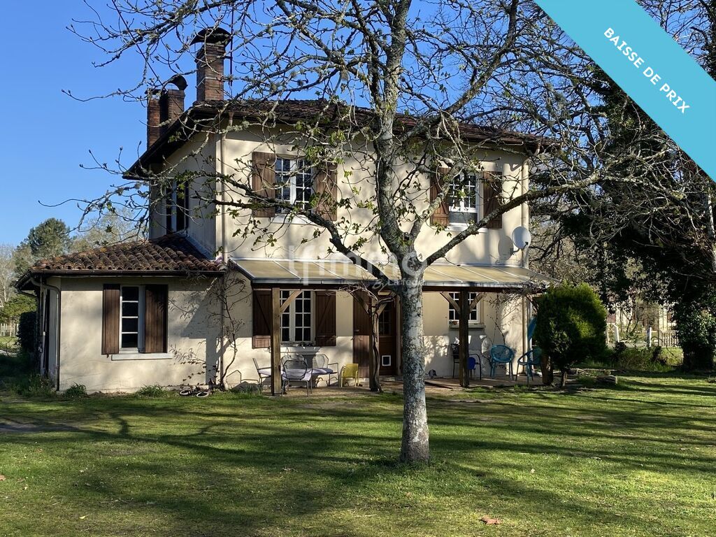 Photo 1 : Maison familiale avec grange et vaste terrain