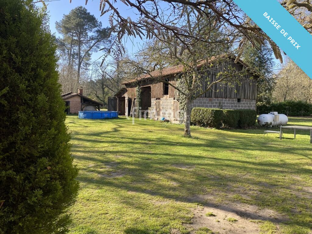 Photo 2 : Maison familiale avec grange et vaste terrain