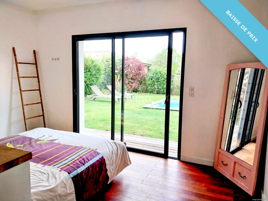 Photo 5 : Maison avec jardin, piscine et garage