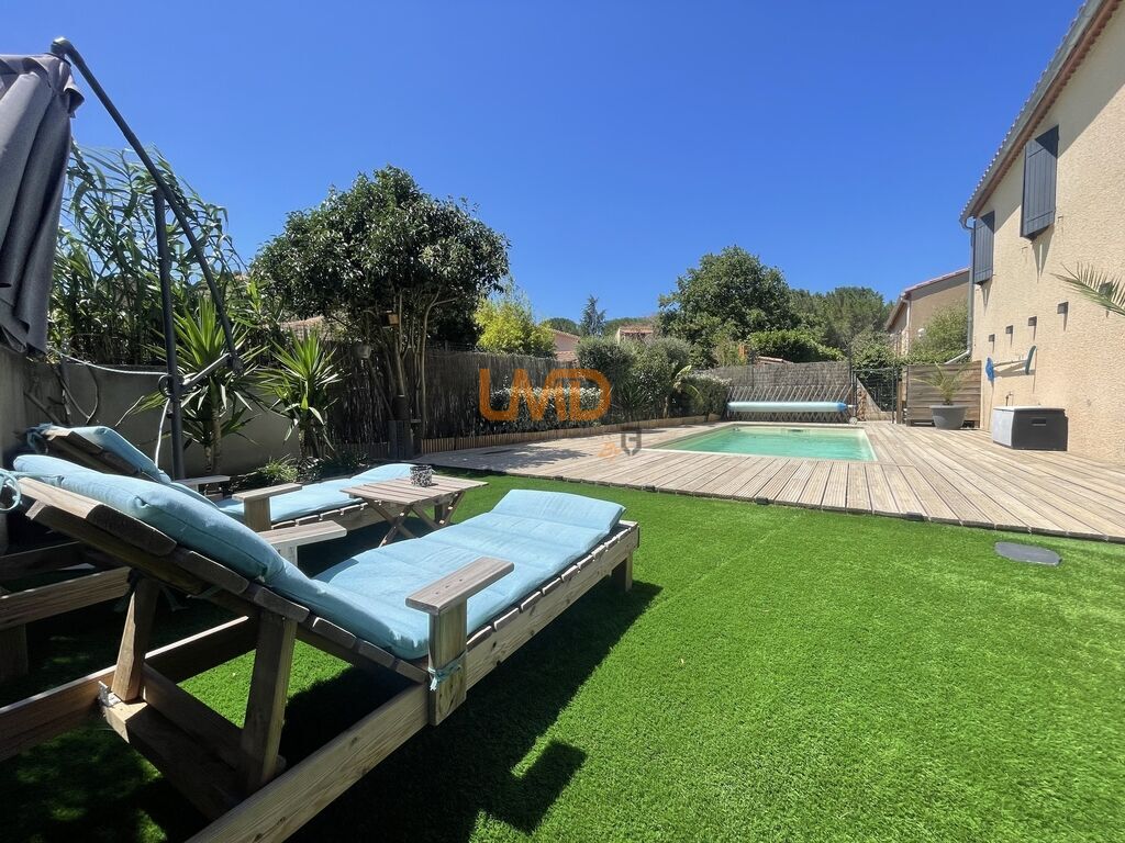 Photo 3 : Villa 4 faces plain pied 114 m2 avec piscine