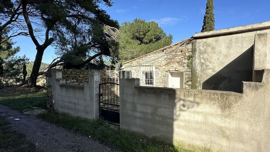 Photo 10 : Ensemble immobilier en pierre avec logements