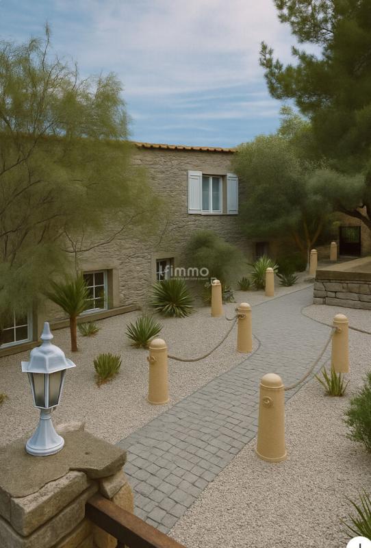 Photo 11 : Ensemble immobilier en pierre avec logements