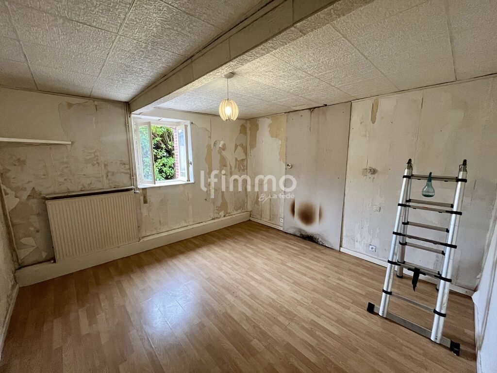 Photo 3 : Maison spacieuse au cœur du centre – Gros potentiel à révéler