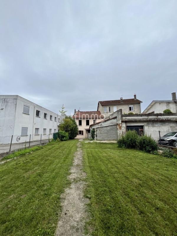 Photo 7 : Maison spacieuse au cœur du centre – Gros potentiel à révéler