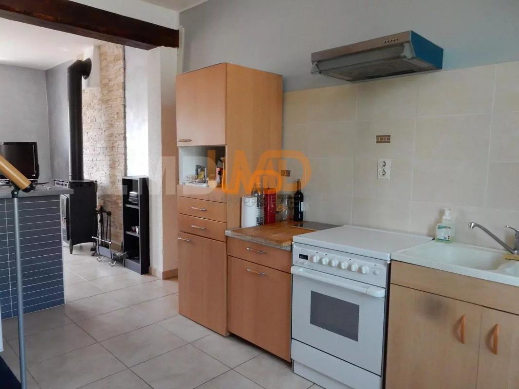 Photo 16 : Maison en pierre - 2 appartements - Garage - Terrain