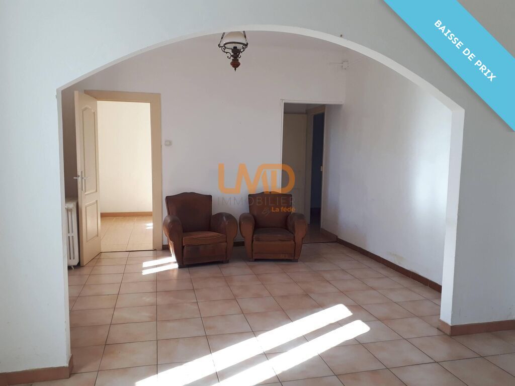 Photo 5 : Maison en pierre - 2 appartements - Garage - Terrain