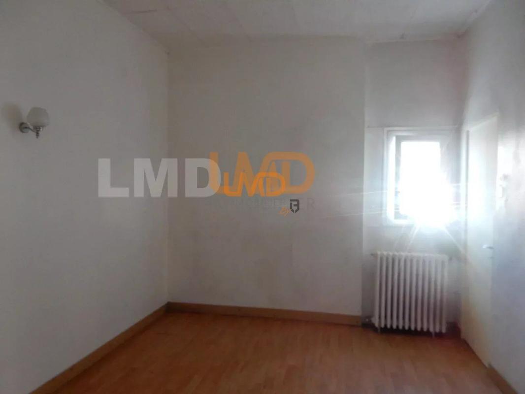 Photo 9 : Maison en pierre - 2 appartements - Garage - Terrain