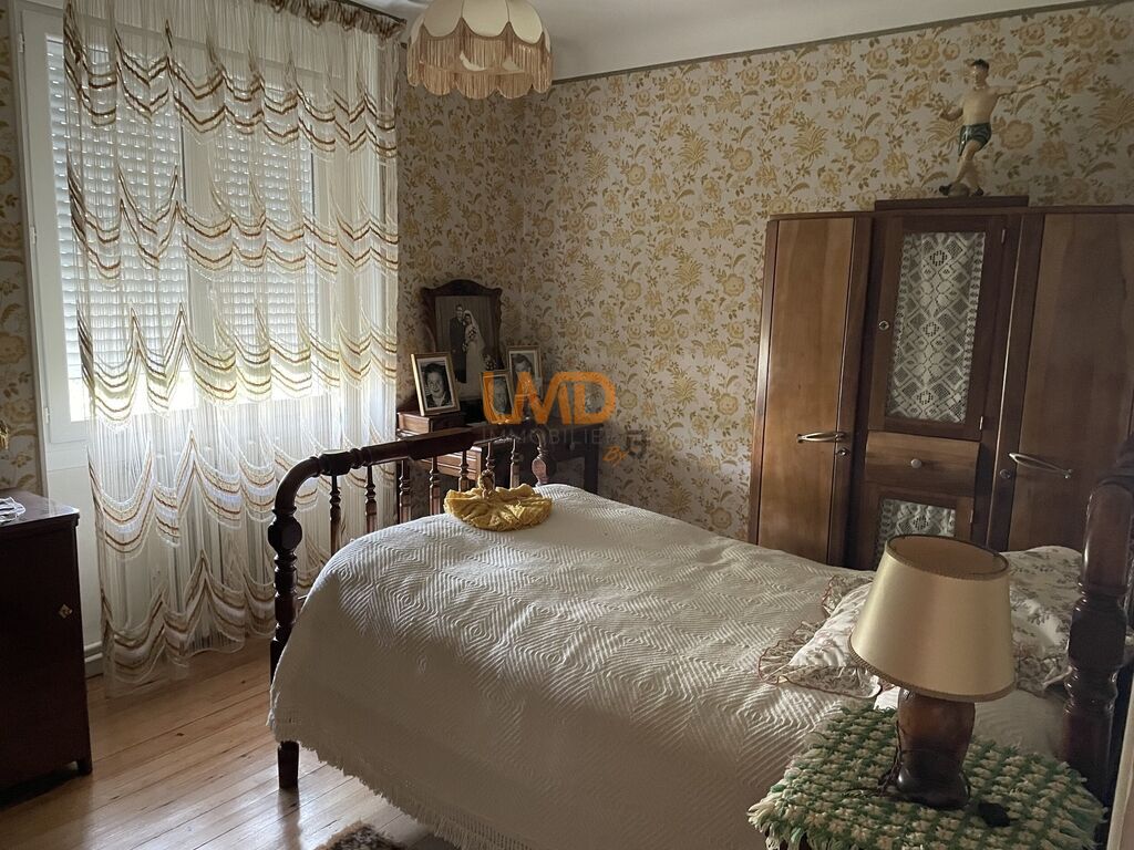 Photo 10 : Maison T7 en pierre sur sous-sol complet avec 816m² de terrain