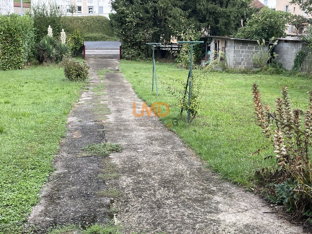 Photo 17 : Maison T7 en pierre sur sous-sol complet avec 816m² de terrain