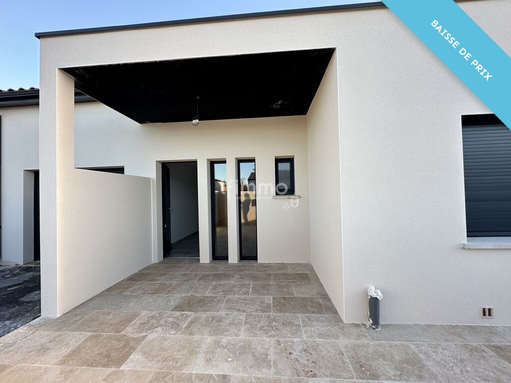 Photo 11 : Un bel équilibre entre confort et intimité maison T4 plain pied