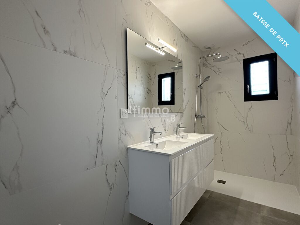 Photo 9 : Un bel équilibre entre confort et intimité maison T4 plain pied