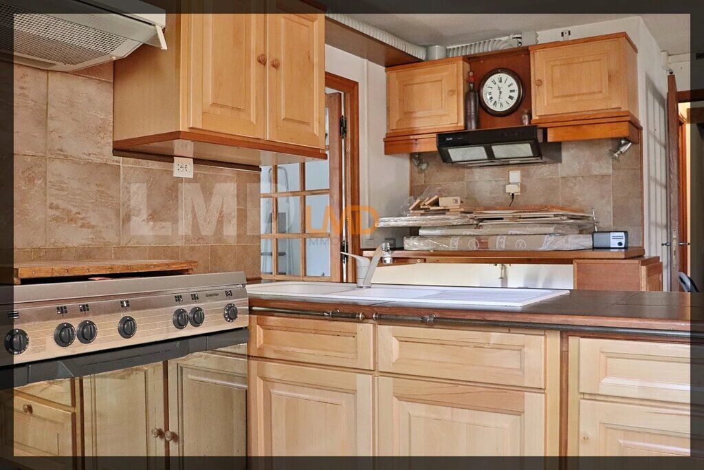 Photo 11 : Charmante maison en pierre avec dépendance et terrain boisé