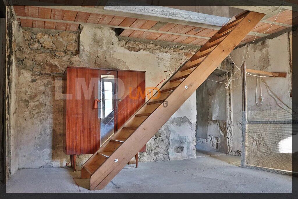 Photo 12 : Charmante maison en pierre avec dépendance et terrain boisé