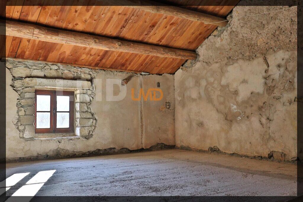 Photo 14 : Charmante maison en pierre avec dépendance et terrain boisé