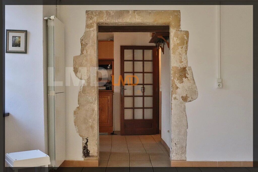 Photo 8 : Charmante maison en pierre avec dépendance et terrain boisé