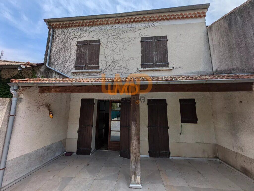 Photo 2 : Maison de Village avec Grande Terrasse et Local Commercial