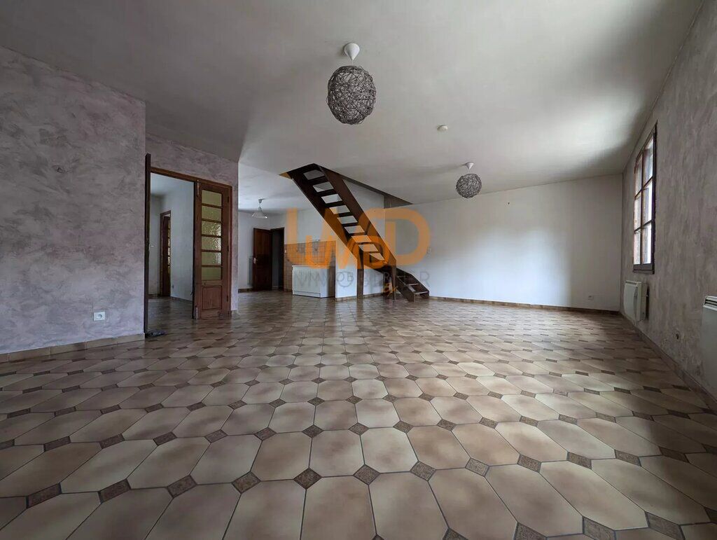 Photo 3 : Maison de Village avec Grande Terrasse et Local Commercial