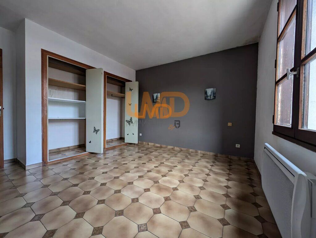 Photo 5 : Maison de Village avec Grande Terrasse et Local Commercial