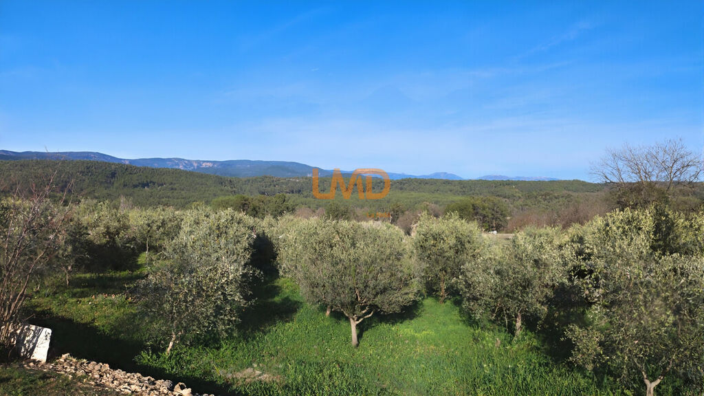 Photo 7 : Mas pierre rénové DPE A 3 suites terrain plat vue dégagée