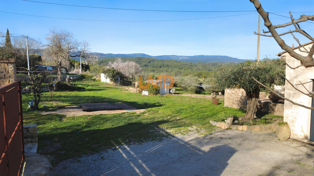 Photo 8 : Mas pierre rénové DPE A 3 suites terrain plat vue dégagée