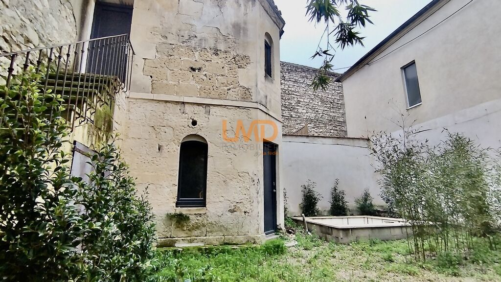 Photo 2 : Grand appartement avec studios, jardin et piscine, centre-ville