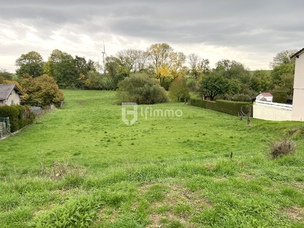 Photo 1 : Vends à Narféfontaine (57220) un terrain a bâtir de 15 ares