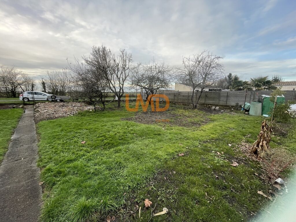 Photo 1 : Terrain à bâtir avec projet de maison possible – Rochefort