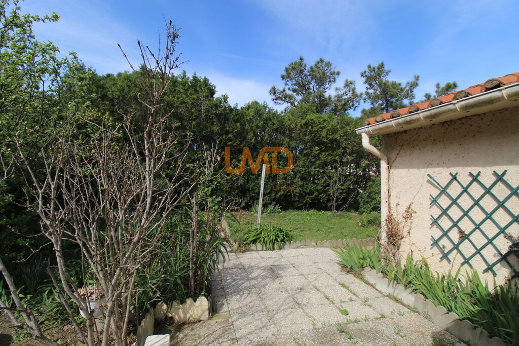 Photo 2 : Villa 3 faces de type 5 sur une parcelle arborée