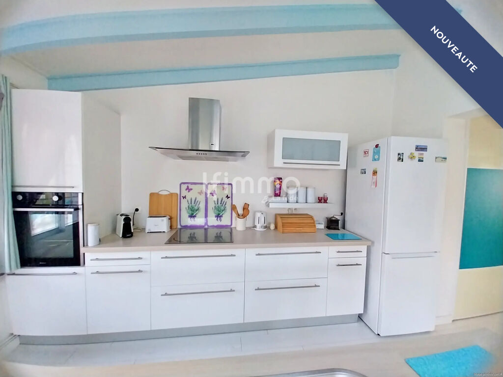 Photo 3 : Maison 3 pièces avec jardin terrasse, garage et parking