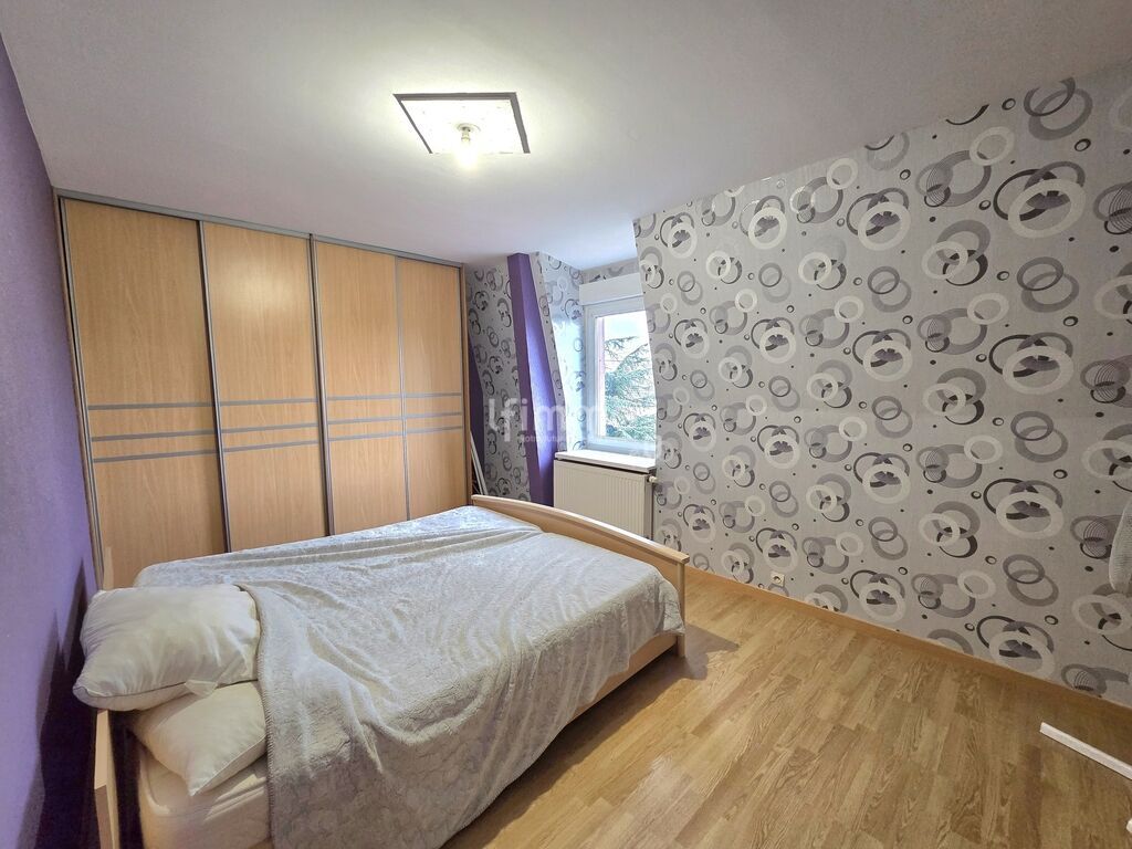 Photo 11 : Maison mitoyenne 1O2 M² à Issenheim Terrain 275 m²