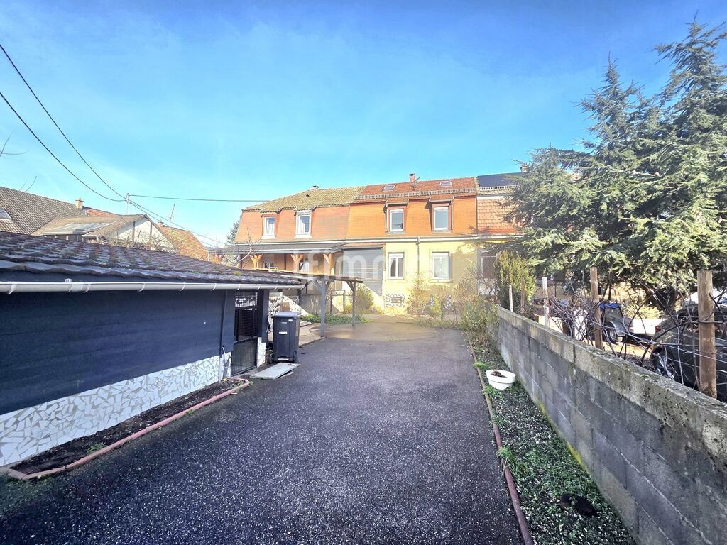 Photo 1 : Maison mitoyenne 1O2 M² à Issenheim Terrain 275 m²