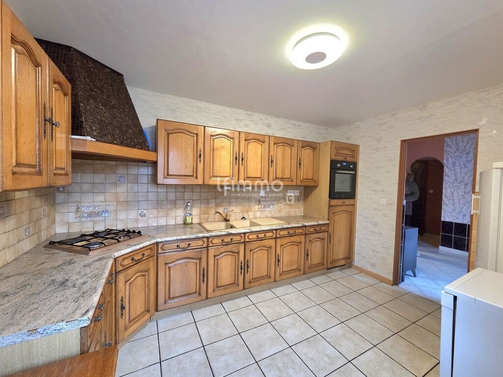 Photo 5 : Maison mitoyenne 1O2 M² à Issenheim Terrain 275 m²