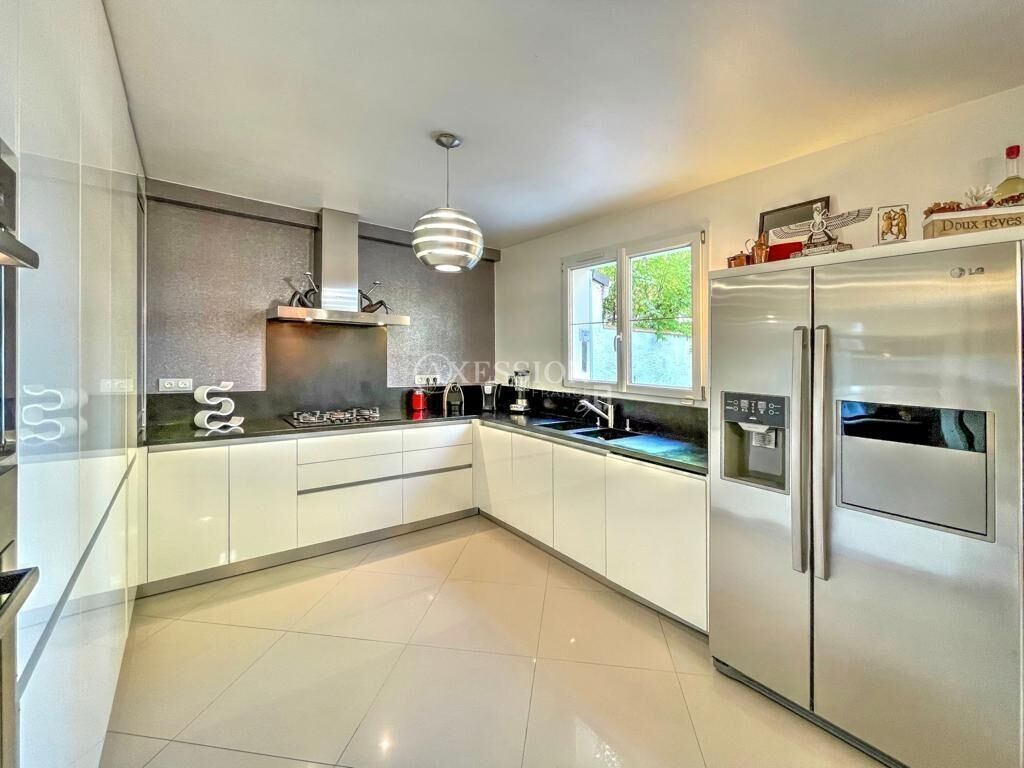 Photo 2 : Maison de 6 pièces - 4 chambres - jardin