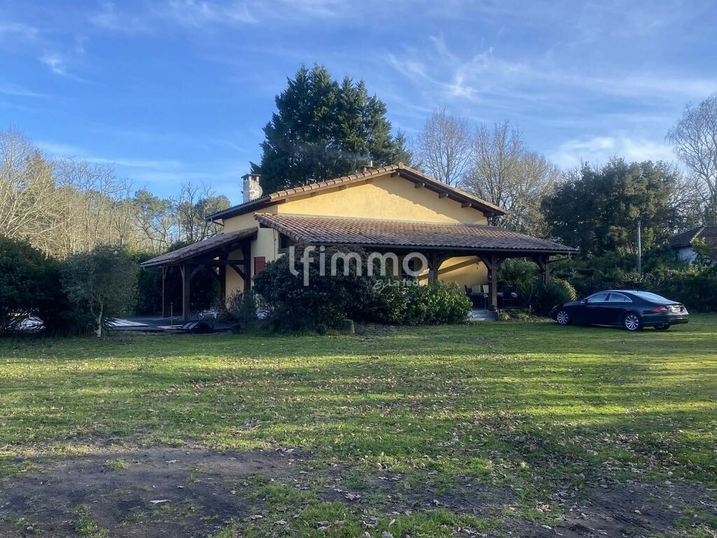 Photo 1 : Maison landaise avec piscine, dépendance et terrain
