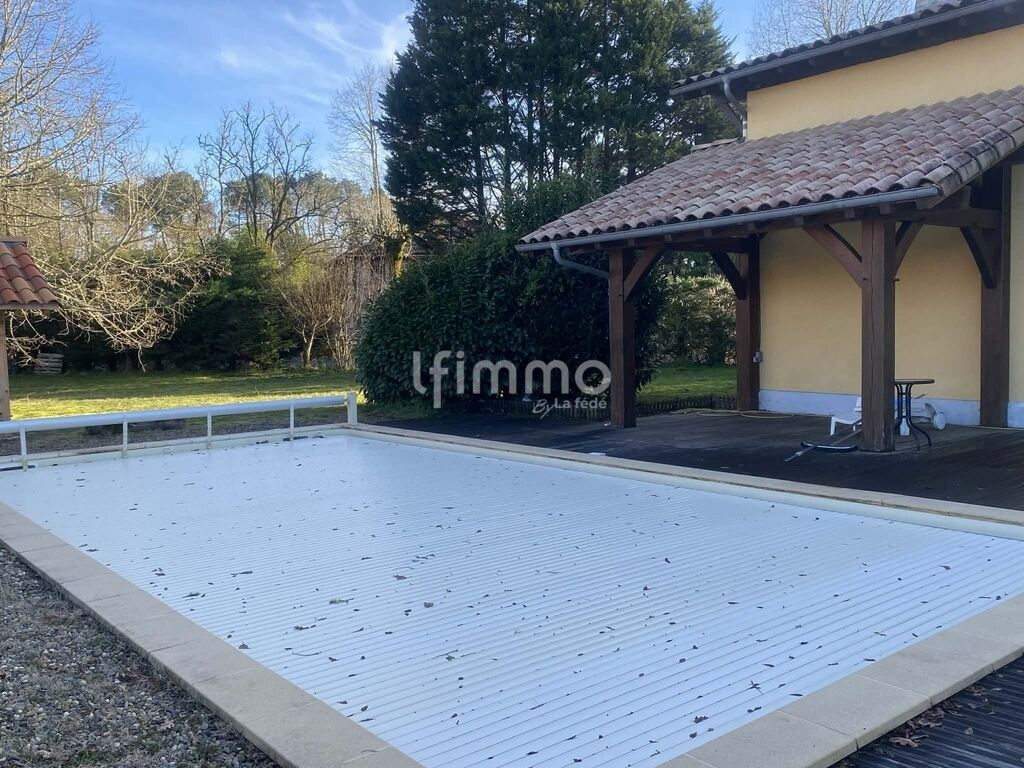 Photo 9 : Maison landaise avec piscine, dépendance et terrain