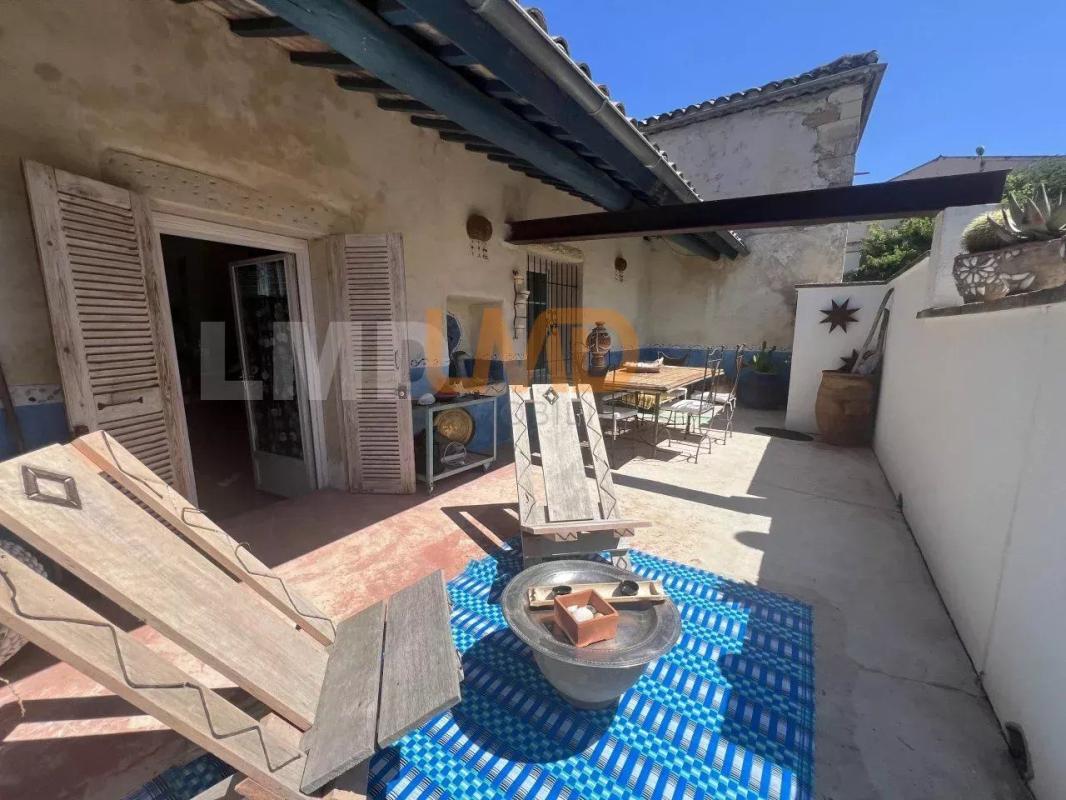 Photo 3 : maison en pierre de 140m2  .. piscine. garage