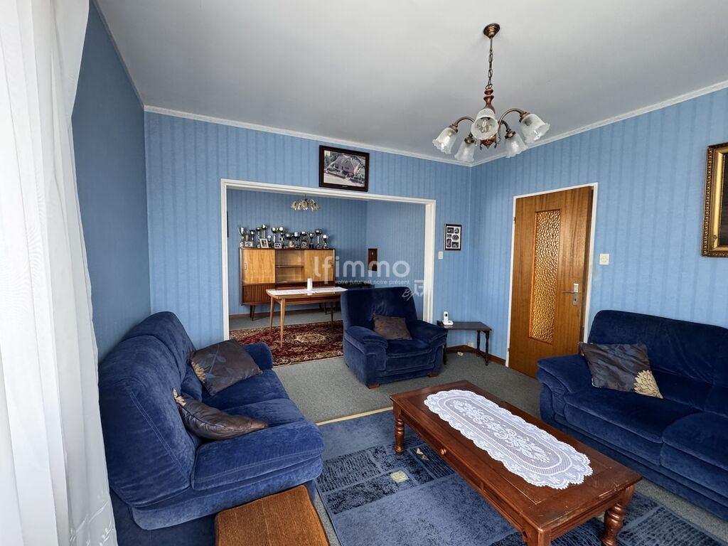 Photo 2 : Maison de plain-pied, garage. Terrain 552 m² Fessenheim (68740)