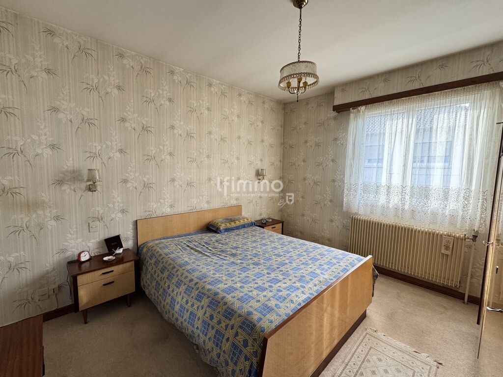 Photo 5 : Maison de plain-pied, garage. Terrain 552 m² Fessenheim (68740)