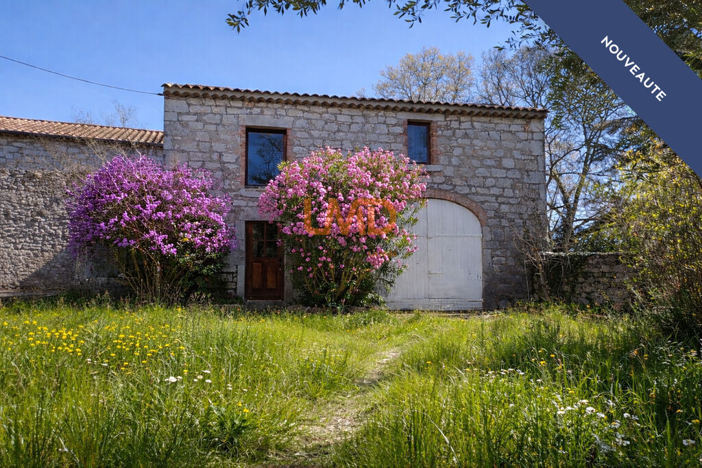 Photo 1 : Maison en pierre 8 pièces 170m2